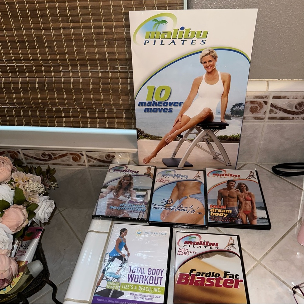 Large, a lot of Malibu Pilates DVDs brand new plus Malibu Pilates chair poster
